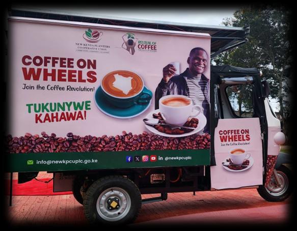 Side view of Coffee on Wheels with Tukunywe Kahawa branding